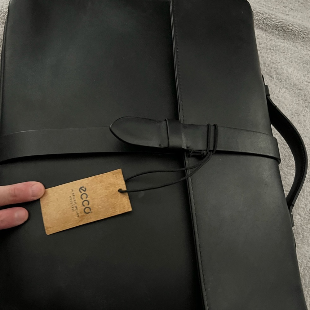 Laptop/ briefcase bag New with dust bag.